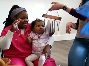 little girl enjoys music time